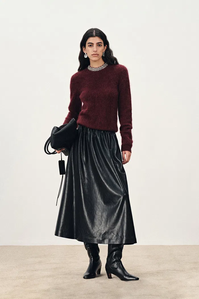 10259-emma-pleated-waist-leather-skirt-in-faux-leather-1.webp
