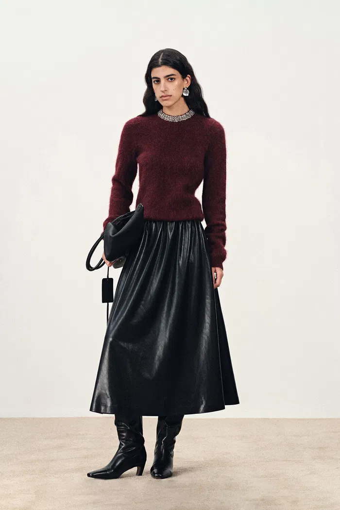 10259-emma-pleated-waist-leather-skirt-in-faux-leather-1.webp