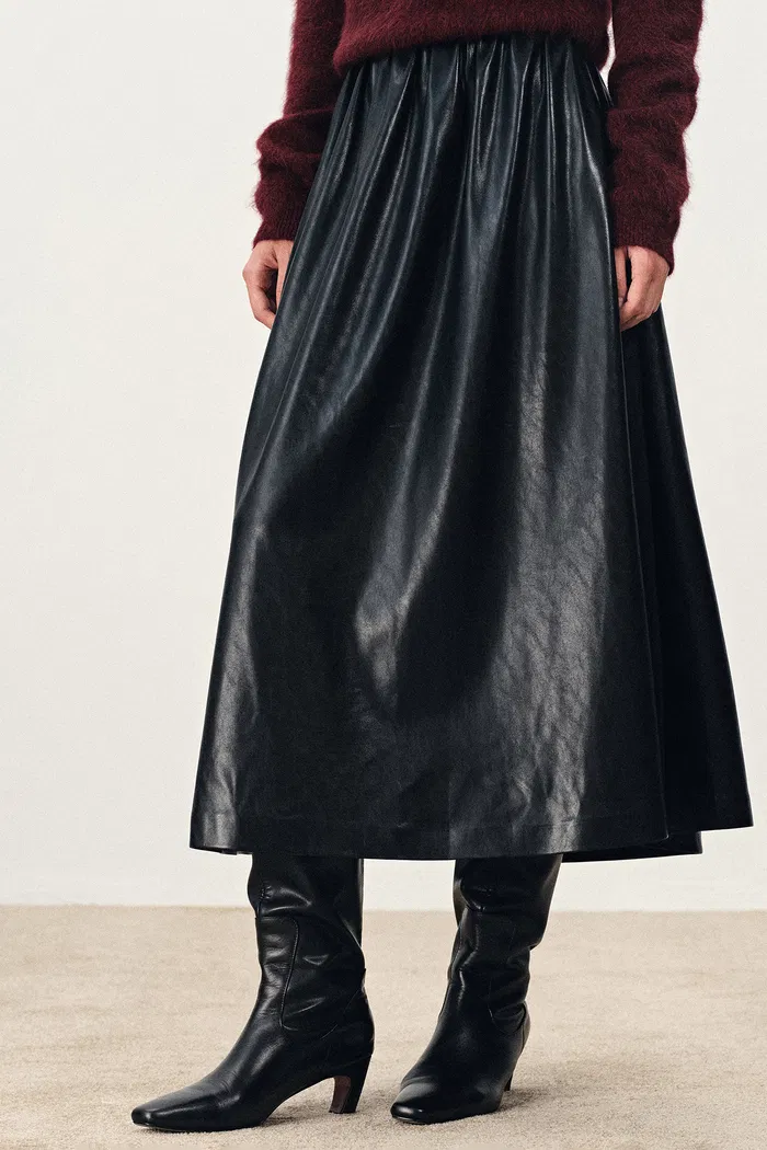 10259-emma-pleated-waist-leather-skirt-in-faux-leather-1.webp