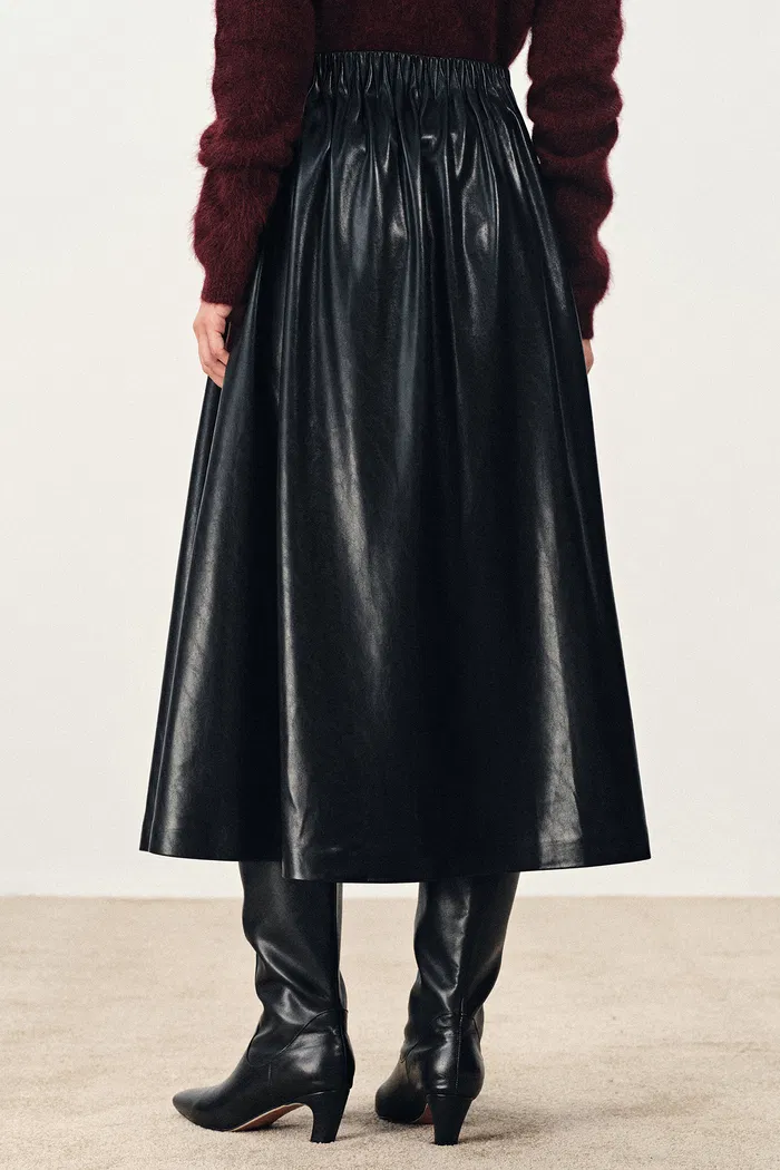 10259-emma-pleated-waist-leather-skirt-in-faux-leather-1.webp