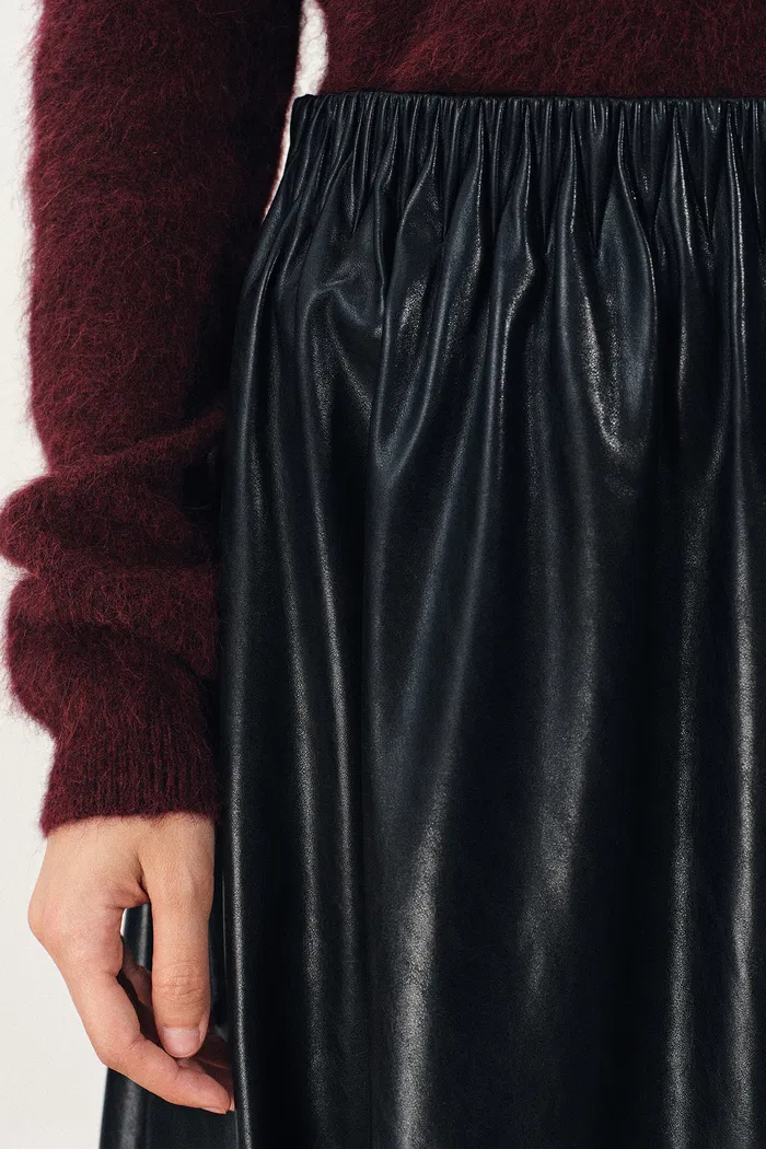 10259-emma-pleated-waist-leather-skirt-in-faux-leather-1.webp