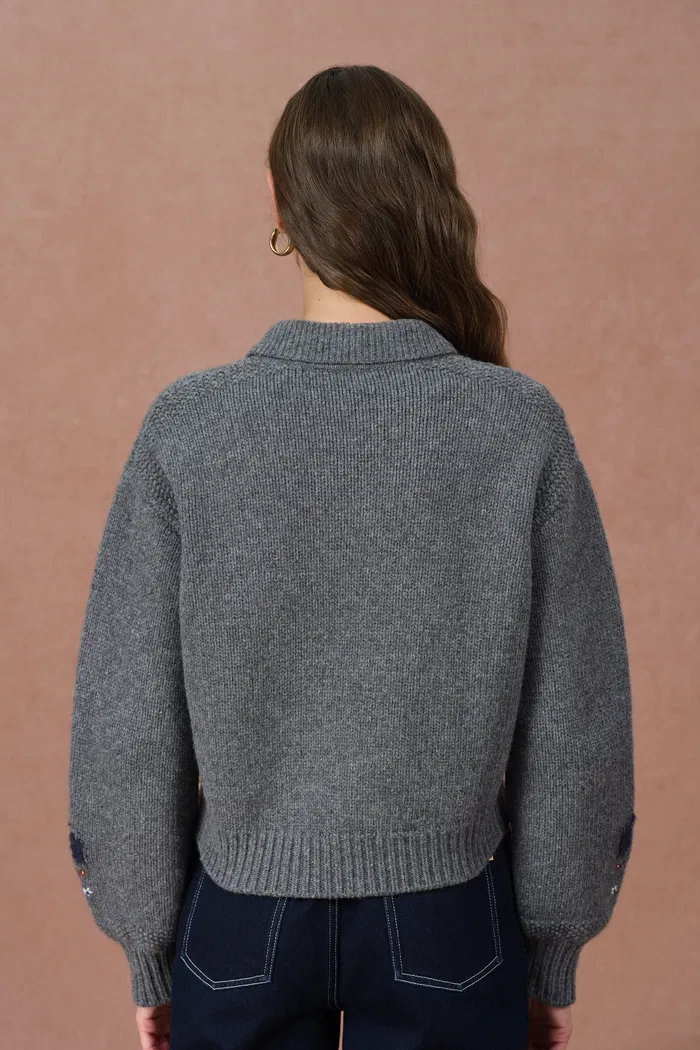 1050-fika-floral-knit-polo-shirt-in-merino-wool-knit-1.webp