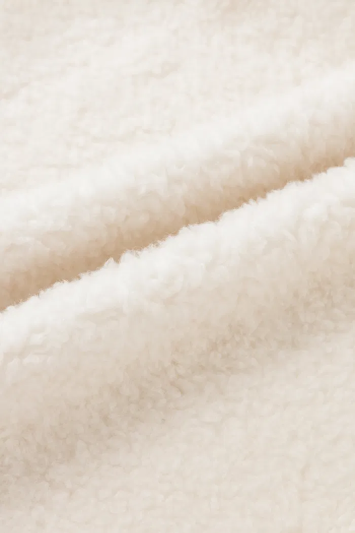 10912-arran-hand-braided-leather-button-short-coat-in-faux-sheepskin-1.webp