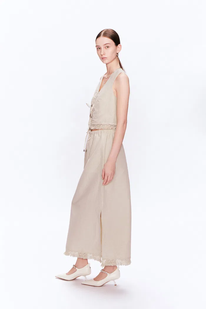 11091-velia-handcrafted-tassel-vest-and-skirt-set-in-linen-blend-1.webp