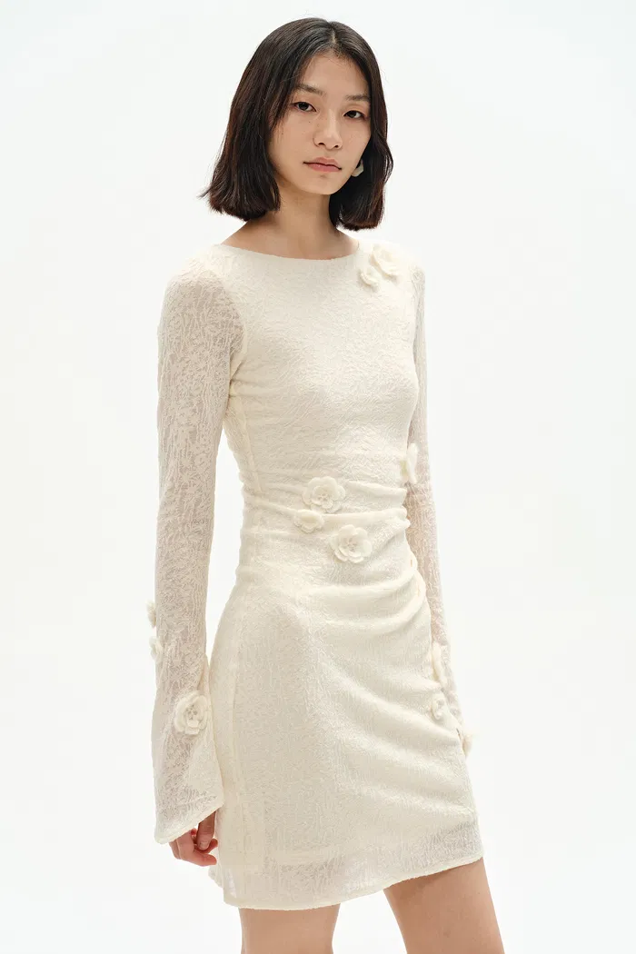 1151-esme-hand-crocheted-long-sleeved-short-dress-in-merino-wool-blend-1.webp