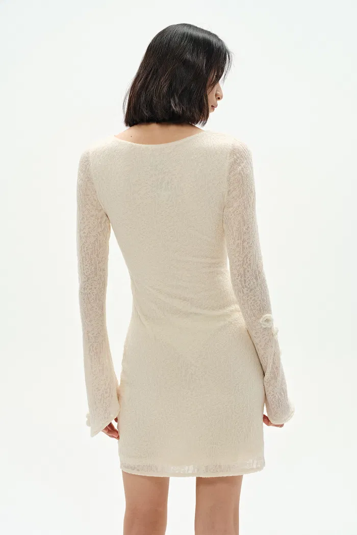 1151-esme-hand-crocheted-long-sleeved-short-dress-in-merino-wool-blend-1.webp