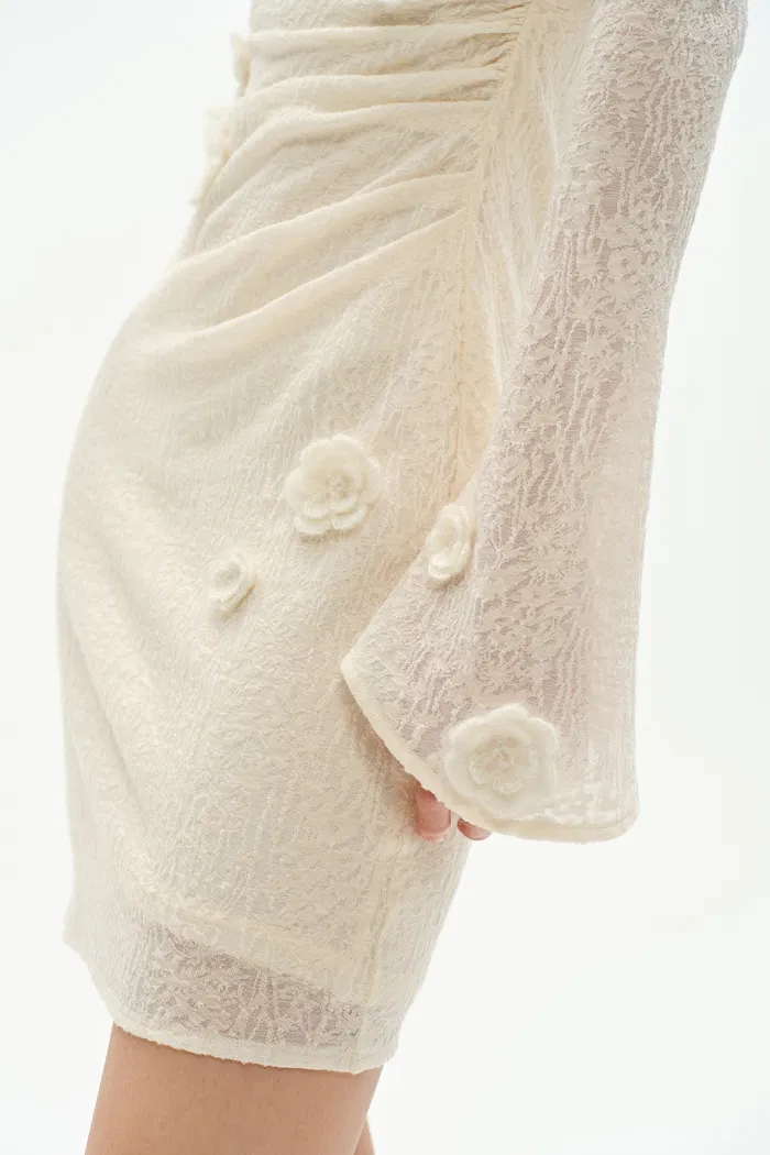 1151-esme-hand-crocheted-long-sleeved-short-dress-in-merino-wool-blend-1.webp