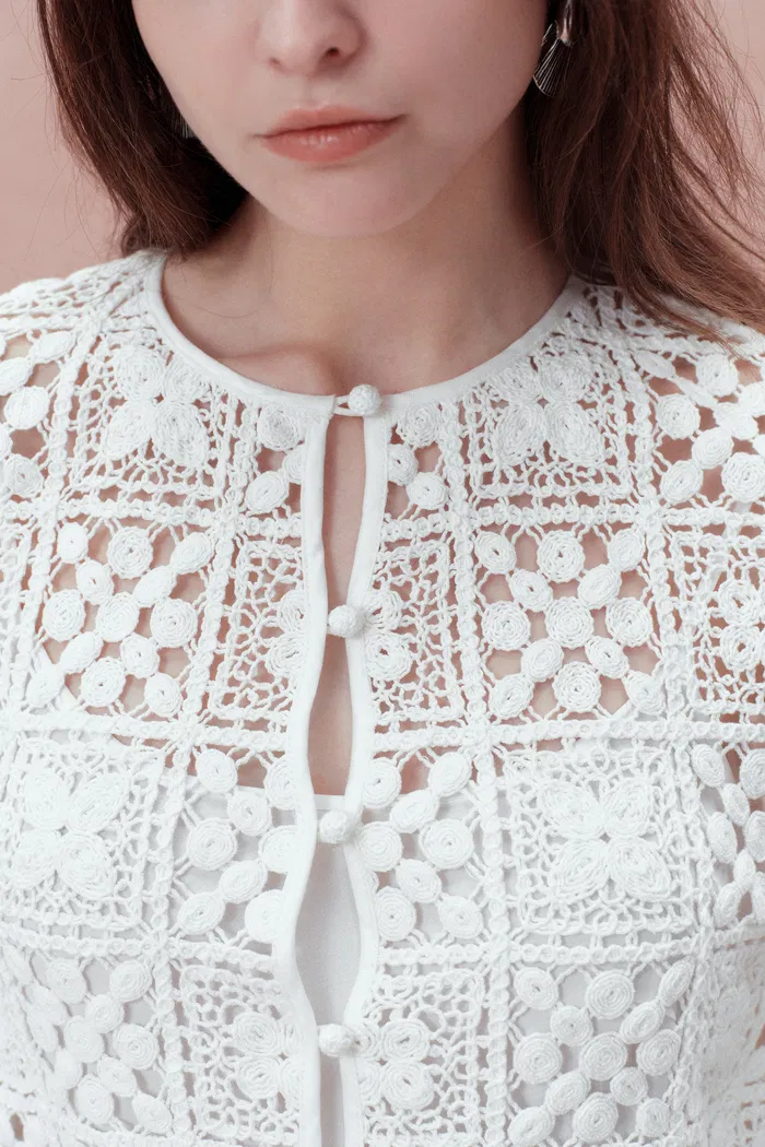 1217-quinn-handcrafted-button-loops-cut-out-crochet-cardigan-in-cotton-1.webp