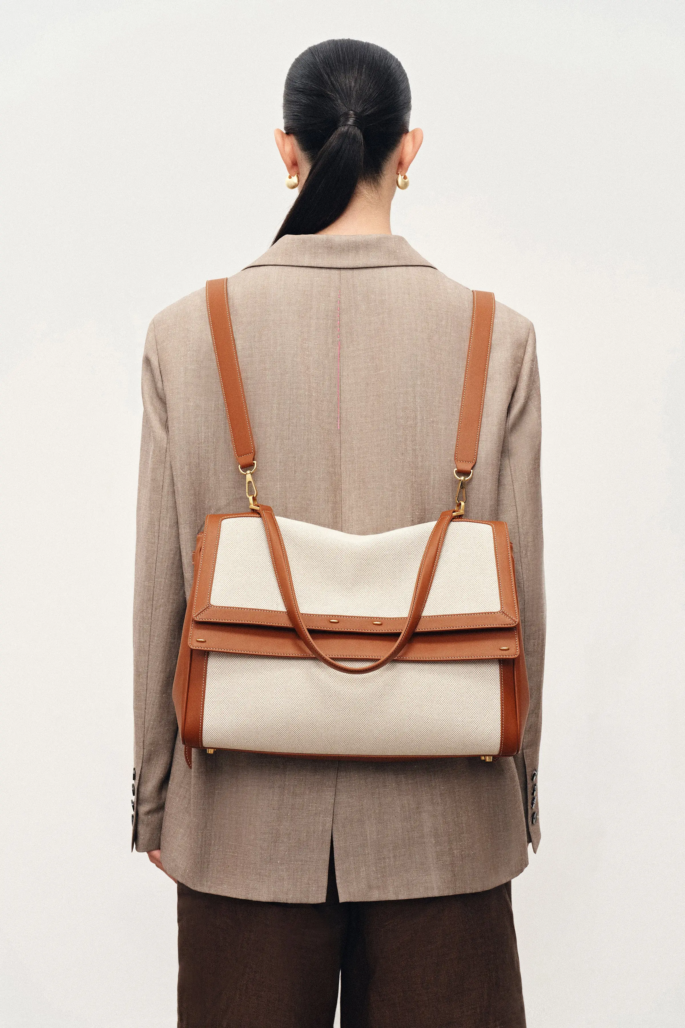 12797-rialto-double-flap-handbag-in-nappa-leather-water-resistant-canvas-1.webp