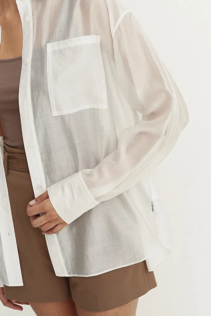 1483-bella-white-sheer-button-up-shirt-in-organza-1.webp