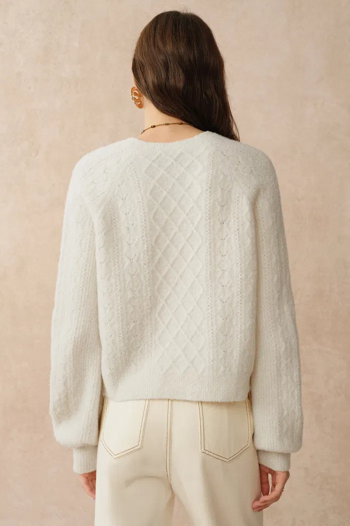 1597-cersei-hand-work-henley-cable-pattern-sweater-in-merino-wool-1.webp