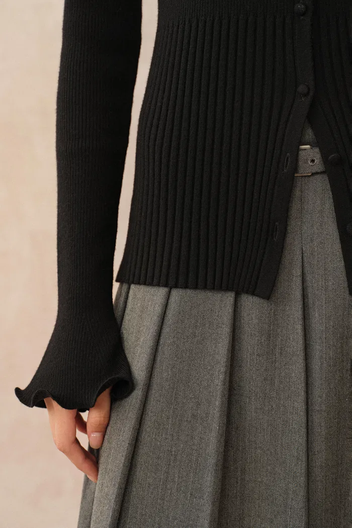 1923-katia-black-wavy-cuff-fitted-cardigan-in-stretchy-merino-wool-cable-knit-1.webp