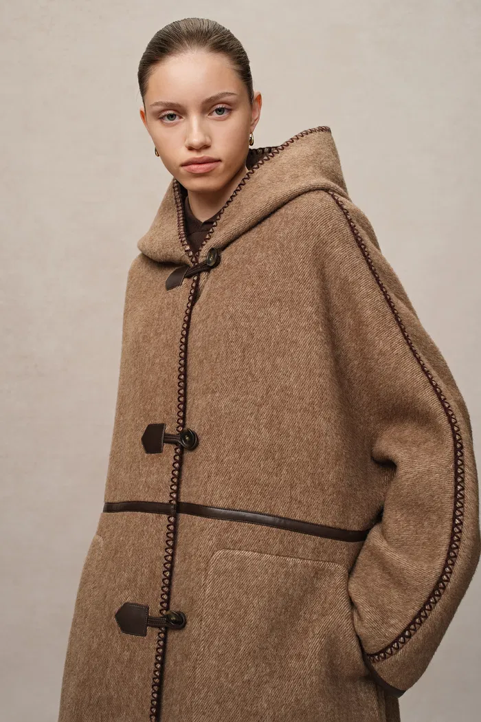 1981-paletot-inspired-overlock-stitch-hooded-coat-in-alpaca-wool-twill-1.webp