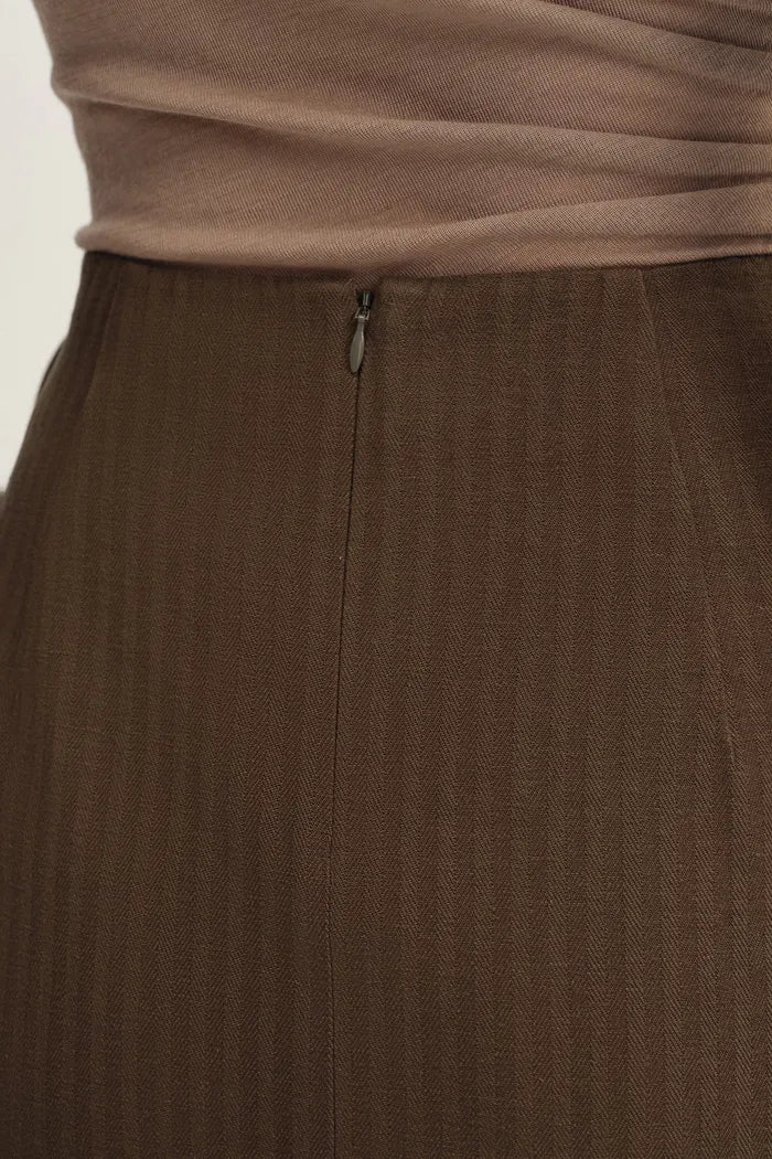 2558-jeanet-adjustable-tie-asymmetric-midi-skirt-in-cotton-herringbone-1.webp