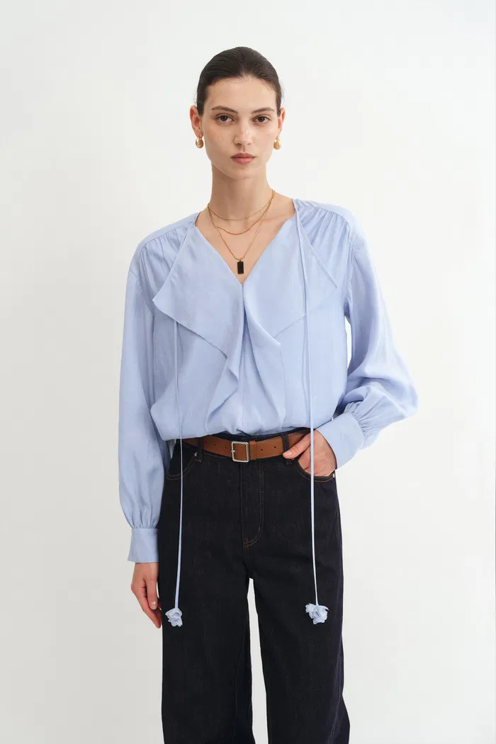 3549-karina-ruffle-v-neck-blouse-in-acetate-modal-blend-1.webp