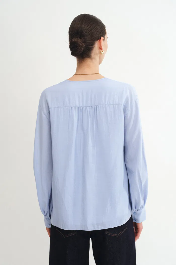 3549-karina-ruffle-v-neck-blouse-in-acetate-modal-blend-1.webp