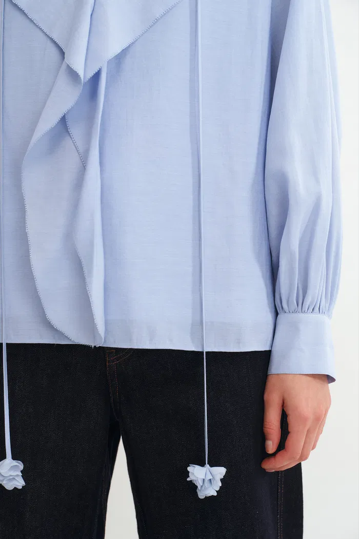 3549-karina-ruffle-v-neck-blouse-in-acetate-modal-blend-1.webp