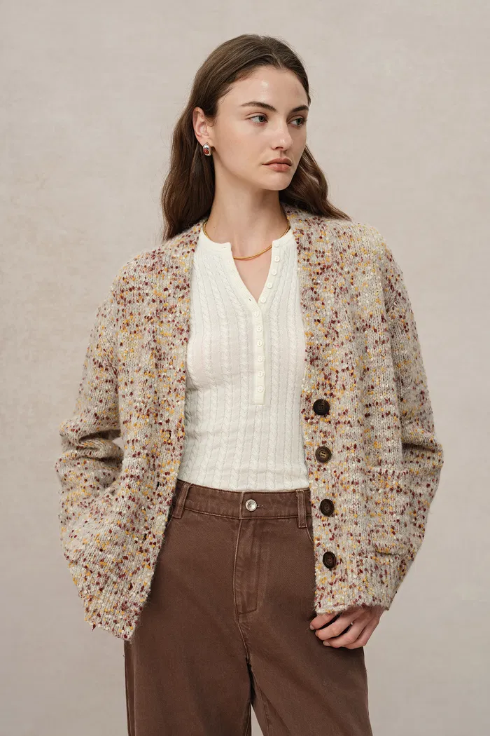 4440-nika-zodiac-jacquard-knit-cardigan-in-wool-mohair-pom-pom-knit-1.webp