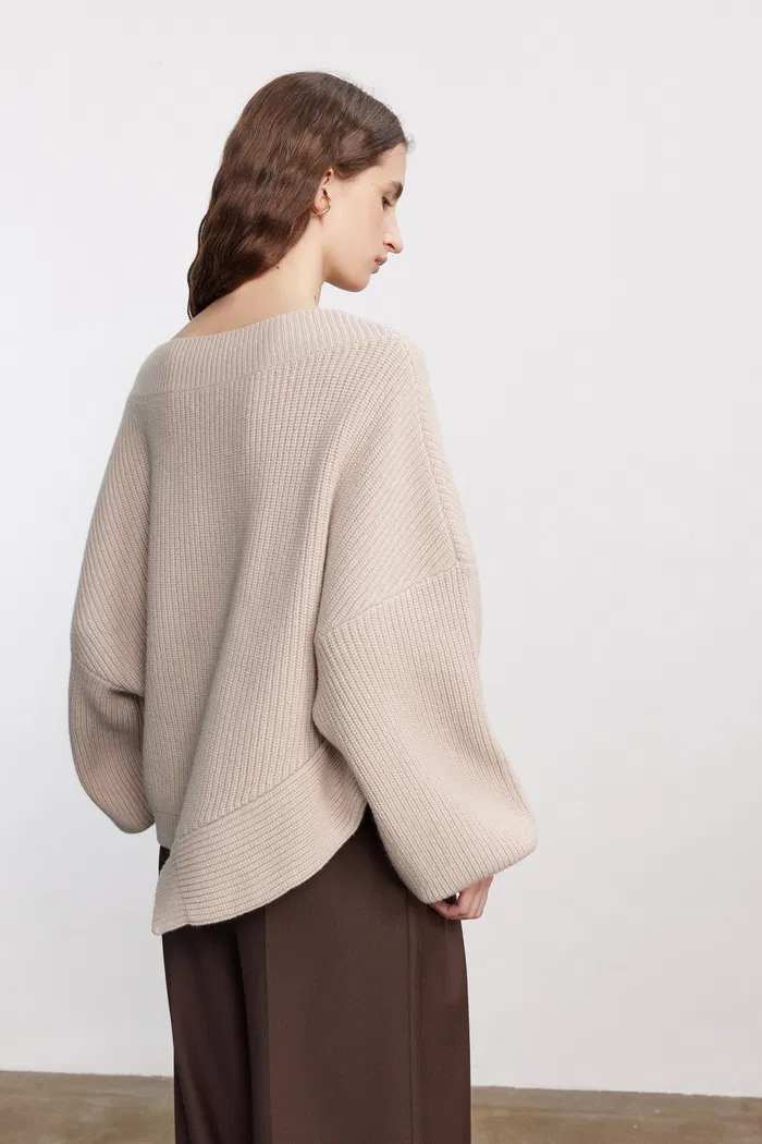 5283-sonia-asymmetrical-hem-sweater-in-merino-wool-knit-1.webp