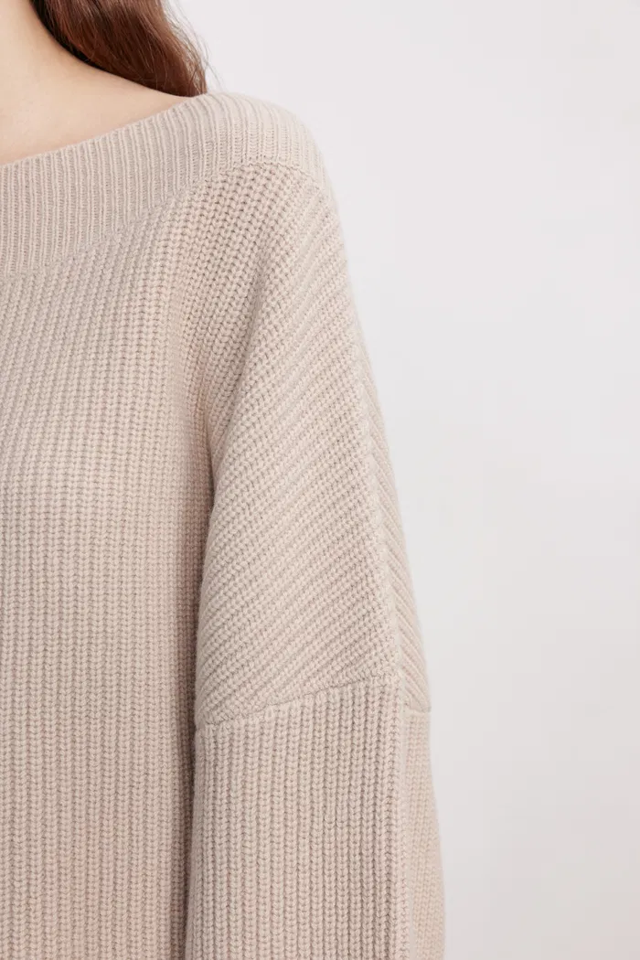 5283-sonia-asymmetrical-hem-sweater-in-merino-wool-knit-1.webp