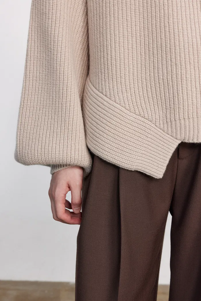 5283-sonia-asymmetrical-hem-sweater-in-merino-wool-knit-1.webp