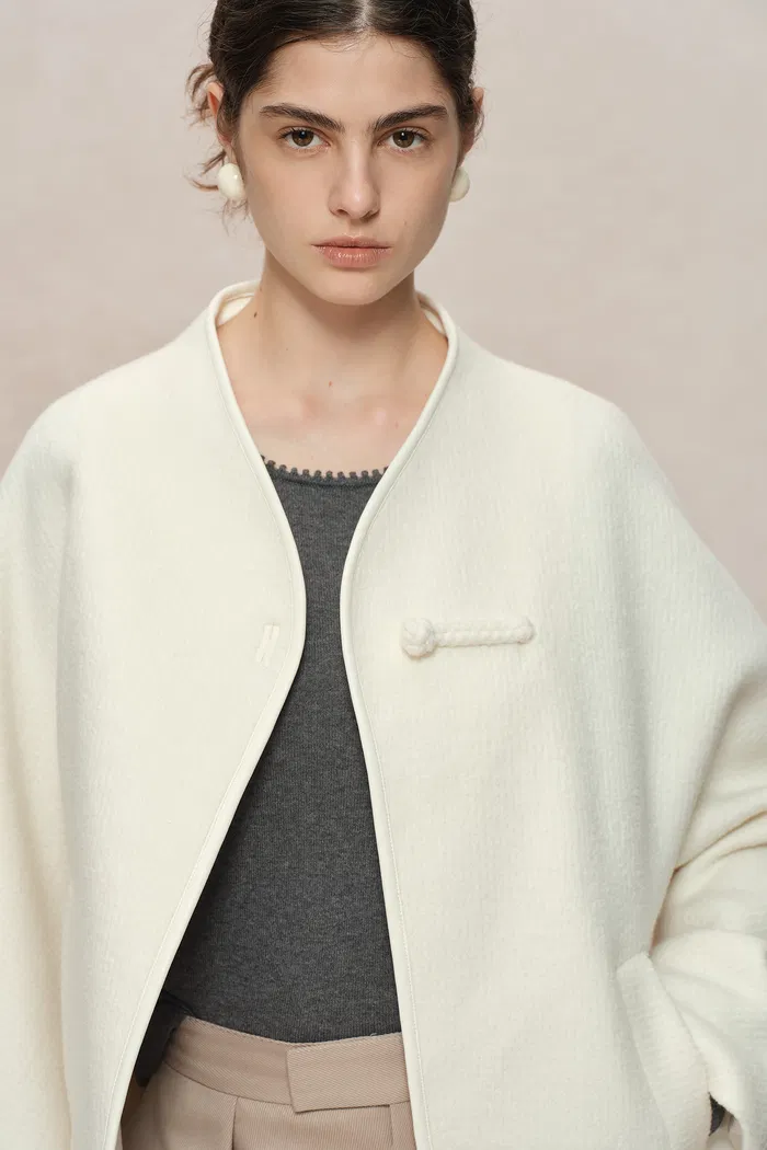5518-riri-hand-finished-mandarin-knot-wool-jacket-in-australian-merino-blend-1.webp