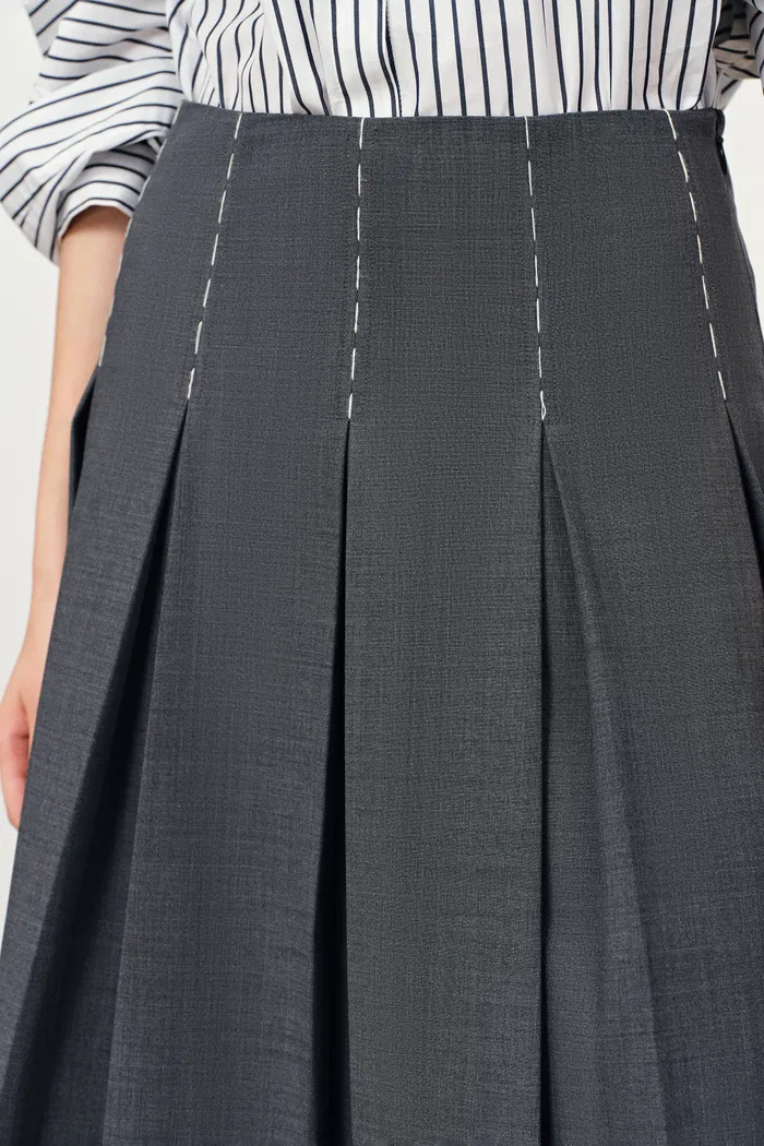 676-ava-hand-embroidered-topstitching-midi-pleated-skirt-in-australian-merino-wool-1.webp