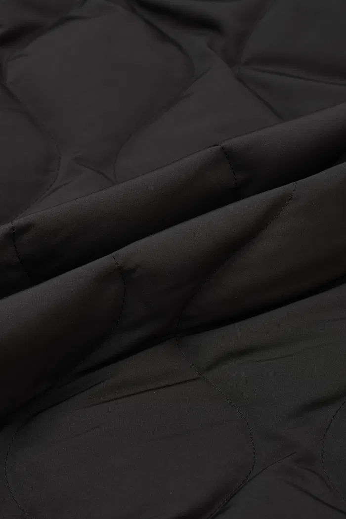 6950-olivia-black-cropped-lightweight-puffer-jacket-in-high-density-water-repellent-fabric-1.webp