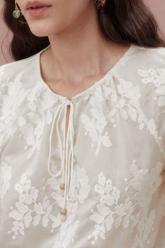 7335-marjorie-embroidered-short-sleeve-blouse-in-sheer-fabric-embroidery-1.webp