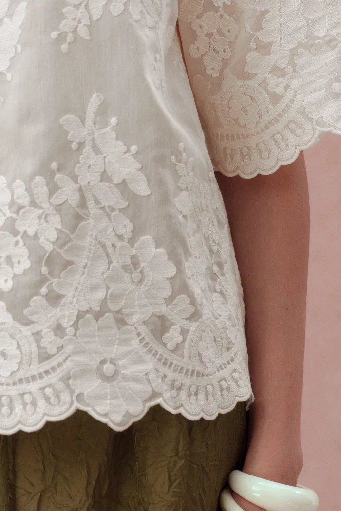 7335-marjorie-embroidered-short-sleeve-blouse-in-sheer-fabric-embroidery-1.webp