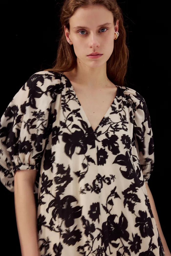 7785-milla-asymmetric-hem-flora-printed-dress-in-tencel-linen-blend-1.webp